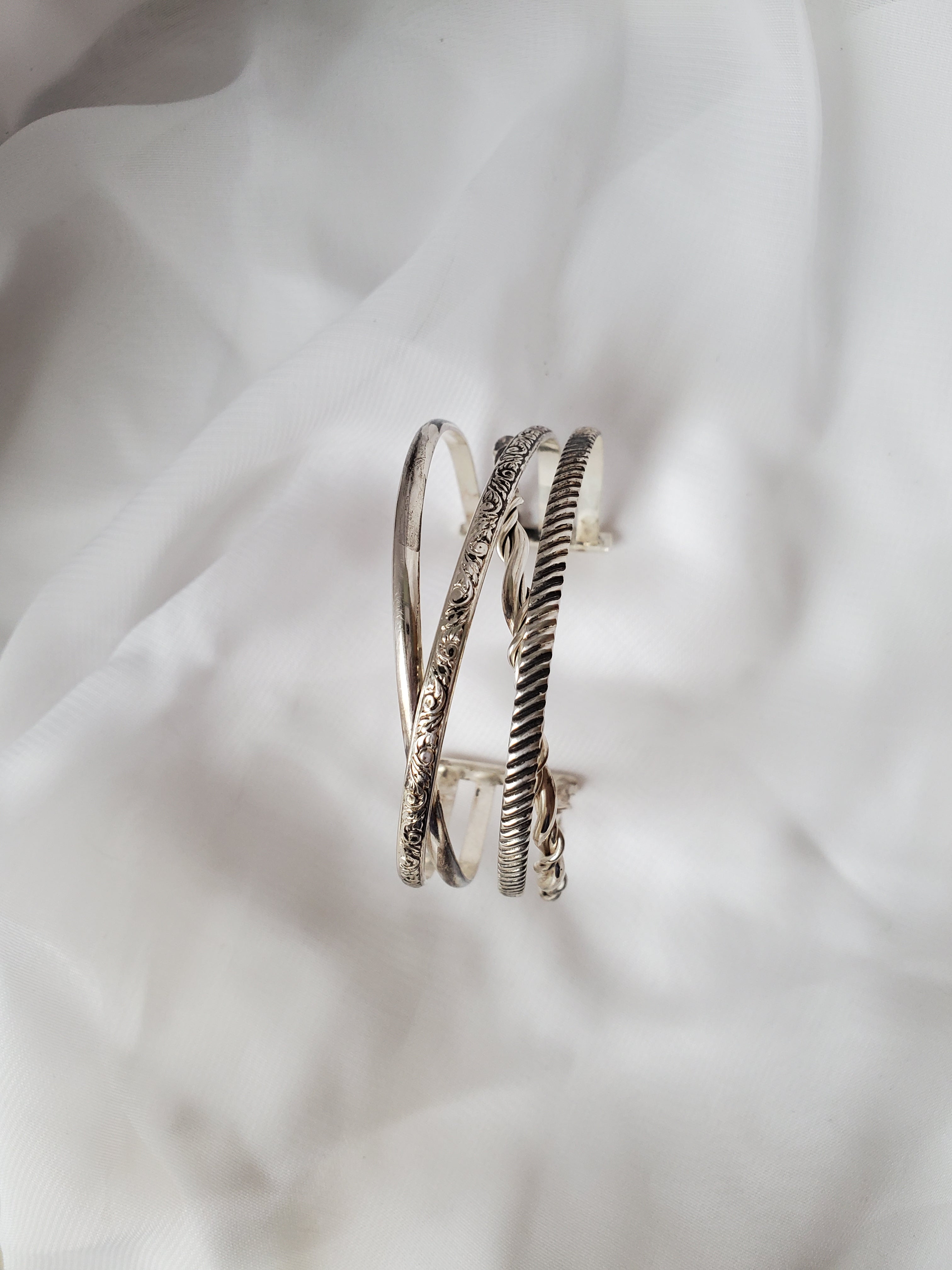 Four Sterling Silver Crossed Cuff